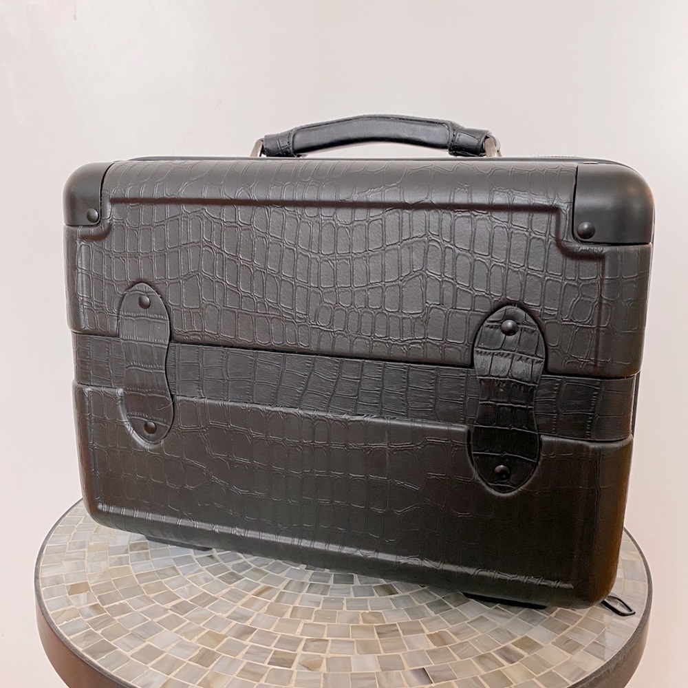 Calpak hard-sided vanity cosmetics travel case